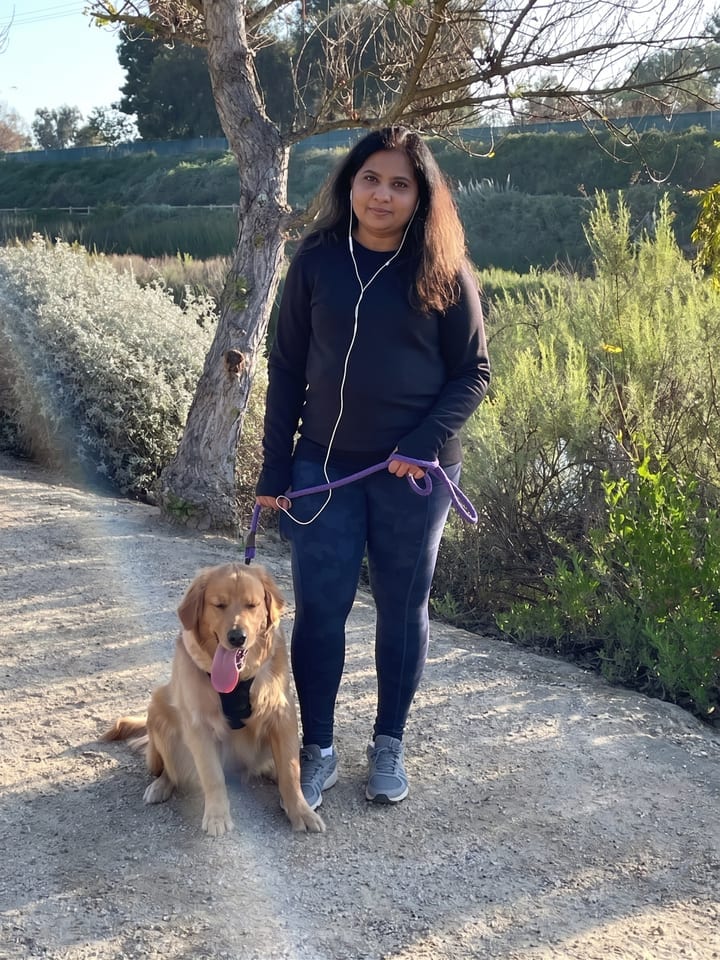Swati outdoors with Bela.
